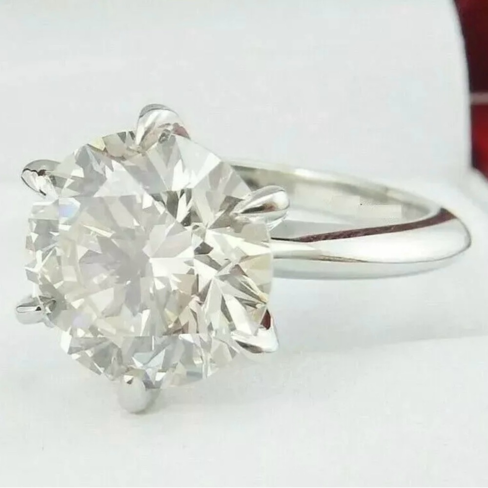 3 carat moissanite ring; 18 carat white gold over silver